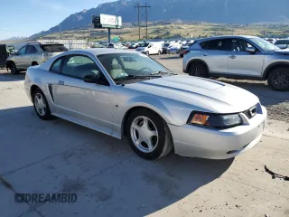 2003 Ford Mustang Standard z VIN 1FAFP40463F327722, wystawiony jako Copart lot #55042765 z przebiegiem 117 010 mil mil oraz Szkoda całkowita • Salvage title. Historia ofert i sprzedaży dostępna na DreamBid. Obrazek 4.