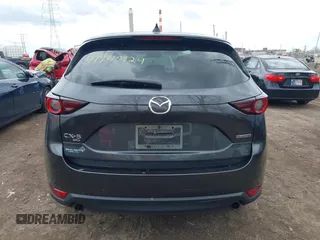 2020 Mazda CX-5 Touring with VIN JM3KFBCM1L0792396, listed as a IAAI auction lot 41949124 with 118,280 mi miles. Bid and sale history available at carsss.com. Image 16.