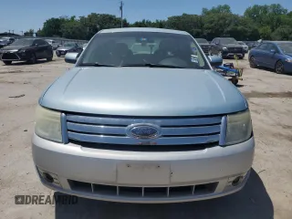 2008 Ford Taurus SEL z VIN 1FAHP24W78G119066, wystawiony jako Copart lot #57571895 z przebiegiem 231 039 mil mil oraz Tytuł czysty. Historia ofert i sprzedaży dostępna na DreamBid. Obrazek 5.