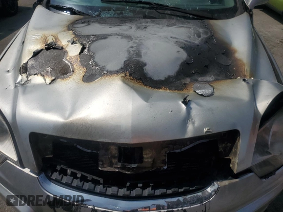 2012 Chevrolet Captiva Sport LT with VIN 3GNAL3E56CS642874, listed as a Copart auction lot 70804154 with Not Provided miles and Salvage Title. Bid and sale history available at DreamBid. Image 12.