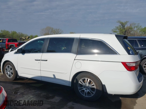 2012 Honda Odyssey EX-L with VIN 5FNRL5H62CB010054, listed as a IAAI auction lot 42040117 with 189,566 mi miles and . Bid and sale history available at carsss.com. Image 15.
