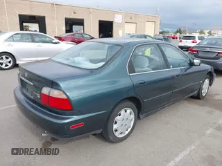 1996 Honda Accord LX with VIN 1HGCD5630TA197512, listed as a IAAI auction lot 41906009 with 79,805 mi miles and . Bid and sale history available at carsss.com. Image 4.