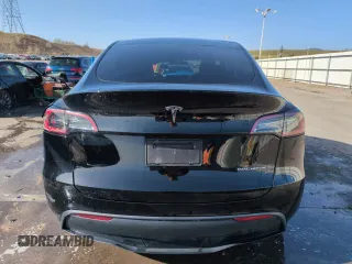 2023 Tesla Model Y Long Range with VIN 7SAYGDEE5PF850358, listed as a Copart auction lot 52581615 with 19,376 mi miles and Salvage Title. Bid and sale history available at DreamBid. Image 6.