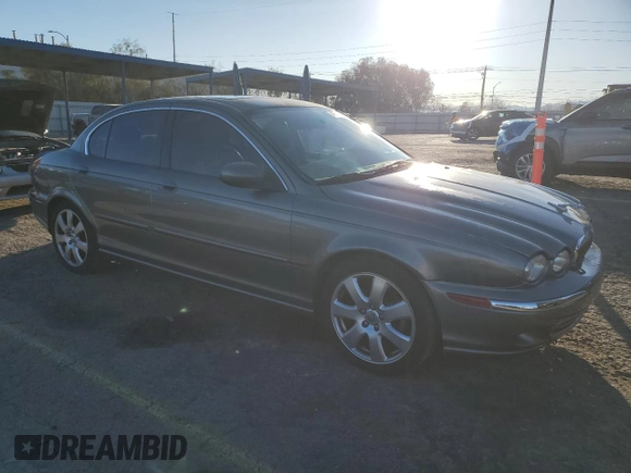2004 Jaguar X-Type with VIN SAJEA51C74WD70684, listed as a Copart auction lot 46536395 with 155,184 mi miles and Salvage Title. Bid and sale history available at carsss.com. Image 4.