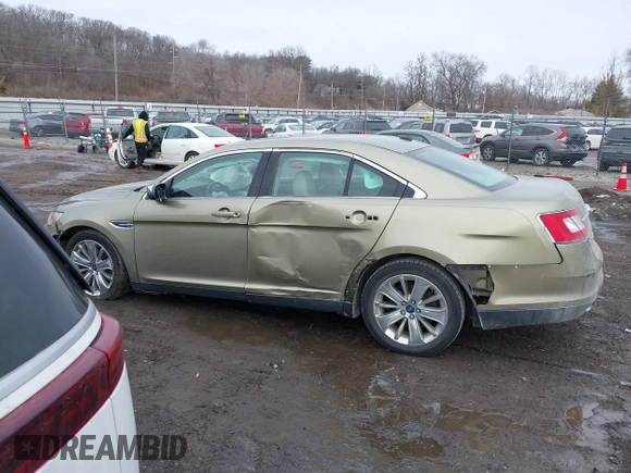 2012 Ford Taurus Limited z VIN 1FAHP2FW7CG128260, wystawiony jako IAAI lot #41640283 z przebiegiem 140 192 mil mil oraz . Historia ofert i sprzedaży dostępna na DreamBid. Obrazek 15.