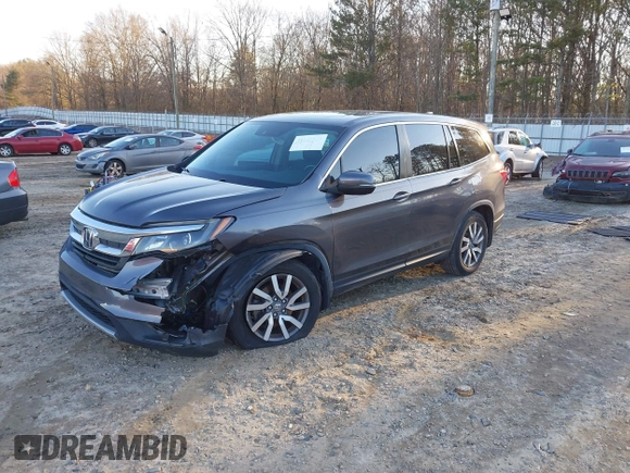 2019 Honda Pilot EX-L z VIN 5FNYF5H5XKB026513, wystawiony jako IAAI lot #41269623 z przebiegiem 62 372 mil mil oraz . Historia ofert i sprzedaży dostępna na DreamBid. Obrazek 16.