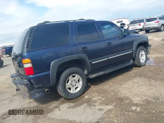 2004 Chevrolet Tahoe LT with VIN 1GNEC13Z84R209220, listed as a IAAI auction lot 41867643 with 385,229 mi miles. Bid and sale history available at carsss.com. Image 4.