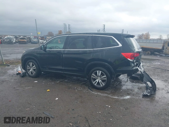 2016 Honda Pilot EX-L with VIN 5FNYF5H56GB031831, listed as a IAAI auction lot 41111342 with 244,197 mi miles and . Bid and sale history available at DreamBid. Image 14.