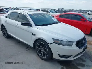 2013 Ford Taurus SHO z VIN 1FAHP2KT2DG171918, wystawiony jako IAAI lot #42146640 z przebiegiem 185 622 mil mil oraz . Historia ofert i sprzedaży dostępna na DreamBid. Obrazek 1.