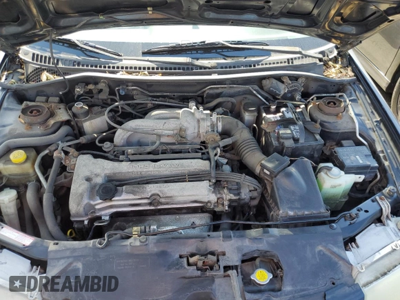 1997 Mazda Protege DX z VIN JM1BC1412V0157268, wystawiony jako Copart lot #61380564 z przebiegiem 85 356 mil mil oraz Szkoda całkowita • Salvage title. Historia ofert i sprzedaży dostępna na DreamBid. Obrazek 11.