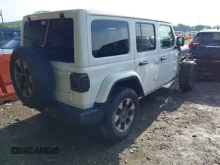 2018 Jeep Wrangler Unlimited Sahara z VIN 1C4HJXEG0JW321355, wystawiony jako IAAI lot #42343112 z przebiegiem 102 457 mil mil oraz . Historia ofert i sprzedaży dostępna na DreamBid. Obrazek 4.