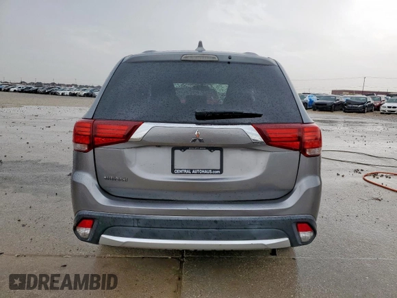 2018 Mitsubishi Outlander ES z VIN JA4AD2A33JJ002909, wystawiony jako Copart lot #55693795 z przebiegiem 95 454 mil mil oraz Szkody całkowita. Historia ofert i sprzedaży dostępna na DreamBid. Obrazek 6.