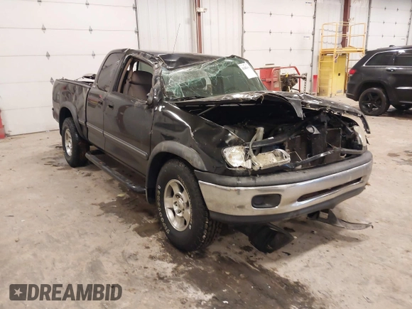 2001 Toyota Tundra SR5 with VIN 5TBRT34131S169696, listed as a IAAI auction lot 41481456 with 215,679 mi miles and . Bid and sale history available at DreamBid. Image 1.