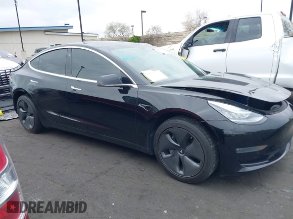 2020 Tesla Model 3 Long Range z VIN 5YJ3E1EB8LF790197, wystawiony jako IAAI lot #42053433 z przebiegiem 73 006 mil mil oraz . Historia ofert i sprzedaży dostępna na DreamBid. Obrazek 14.