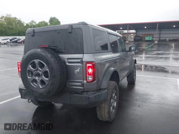 2022 Ford Bronco with VIN 1FMDE5BH5NLB12538, listed as a IAAI auction lot 42161313 with 64,518 mi miles and . Bid and sale history available at DreamBid. Image 4.