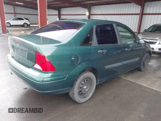 2001 Ford Focus LX with VIN 1FAFP33P51W205396, listed as a IAAI auction lot 41563111 with 95,882 mi miles and . Bid and sale history available at carsss.com. Image 4.