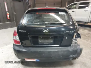 2007 Hyundai Accent SE with VIN KMHCN36C67U026540, listed as a IAAI auction lot 41062633 with 70,143 mi miles. Bid and sale history available at carsss.com. Image 17.