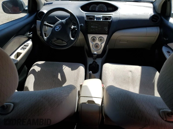 2007 Toyota Yaris with VIN JTDBT923371049998, listed as a Copart auction lot 48582445 with 217,625 mi miles and Salvage Title. Bid and sale history available at DreamBid. Image 8.