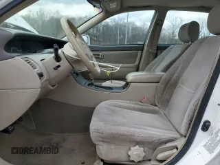 2002 Toyota Avalon XL with VIN 4T1BF28B42U250096, listed as a Copart auction lot 51817975 with 154,305 mi miles and Salvage Title. Bid and sale history available at DreamBid. Image 7.
