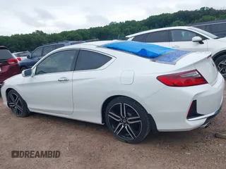 2016 Honda Accord Touring with VIN 1HGCT2B09GA007614, listed as a IAAI auction lot 42532621 with 200,935 mi miles and . Bid and sale history available at DreamBid. Image 14.