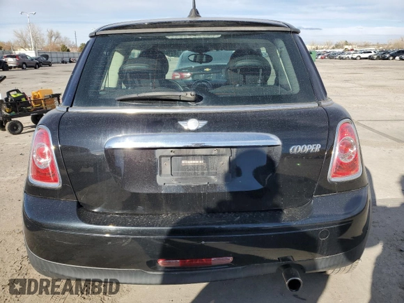 2012 MINI Hardtop with VIN WMWSU3C54CT255997, listed as a Copart auction lot 49162435 with 87,708 mi miles and Salvage Title. Bid and sale history available at DreamBid. Image 6.