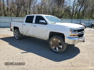 2018 Chevrolet Silverado 1500 LT with VIN 3GCPCREC8JG226975, listed as a Copart auction lot 49919515 with 200,878 mi miles and Salvage Title. Bid and sale history available at DreamBid. Image 4.
