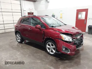 2016 Chevrolet Trax LTZ with VIN 3GNCJRSB9GL166289, listed as a IAAI auction lot 41674434 with 157,109 mi miles. Bid and sale history available at carsss.com. Image 1.