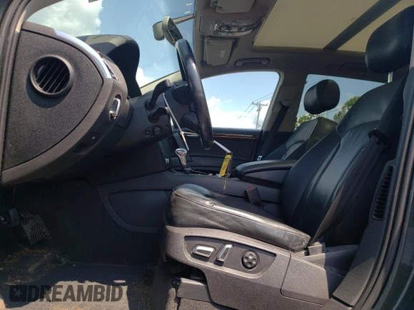 2015 Audi Q7 Premium Plus with VIN WA1LGAFE0FD011271, listed as a Copart auction lot 63250995 with 168,223 mi miles and Salvage title. Bid and sale history available at DreamBid. Image 7.