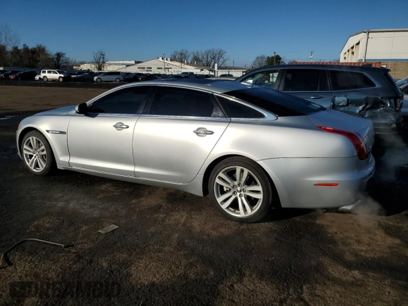 2013 Jaguar XJ Portfolio with VIN SAJWJ2GD3D8V47266, listed as a Copart auction lot 46824695 with 157,151 mi miles and Salvage title. Bid and sale history available at DreamBid. Image 2.