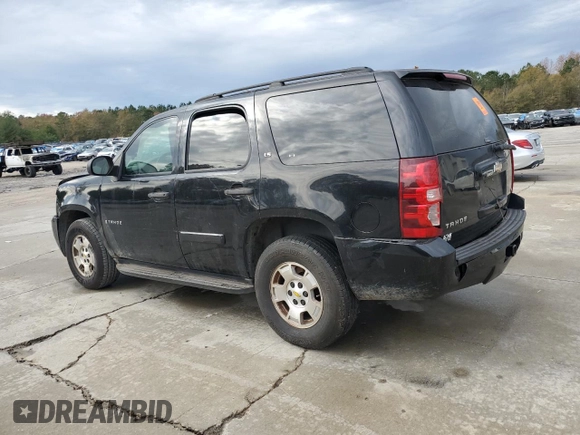 2009 Chevrolet Tahoe LS with VIN 1GNFC13029R149349, listed as a Copart auction lot 83327714 with 246,757 mi miles and Salvage title. Bid and sale history available at DreamBid. Image 2.
