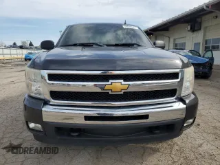 2010 Chevrolet Silverado 1500 LT with VIN 1GCSKSE33AZ114332, listed as a Copart auction lot 54046925 with 137,300 mi miles and Salvage Title. Bid and sale history available at DreamBid. Image 5.
