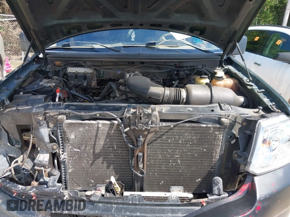 2004 Ford F-150 XLT with VIN 1FTRW14W14KC06268, listed as a IAAI auction lot 42444789 with 408,530 mi miles and . Bid and sale history available at DreamBid. Image 10.