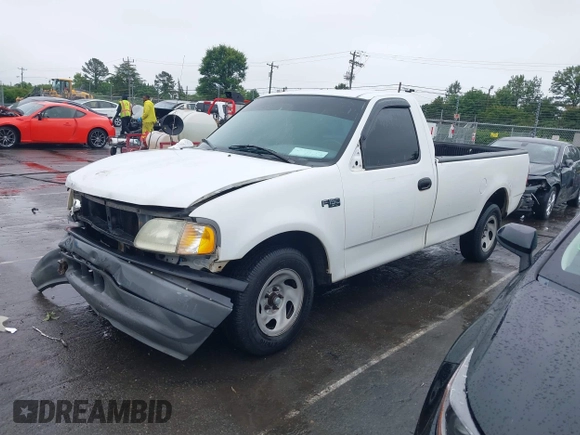 2002 Ford F-150 XL with VIN 1FTRF17242NB86232, listed as a IAAI auction lot 42336859 with 119,321 mi miles and . Bid and sale history available at DreamBid. Image 2.