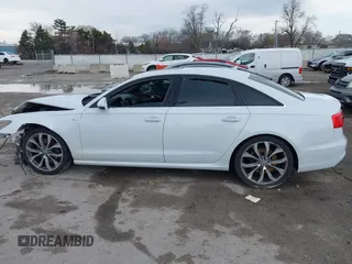 2014 Audi A6 Prestige z VIN WAUHMAFC6EN098487, wystawiony jako IAAI lot #41908034 z przebiegiem 146 298 mil mil oraz . Historia ofert i sprzedaży dostępna na DreamBid. Obrazek 14.