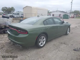 2023 Dodge Charger SXT with VIN 2C3CDXBG8PH608380, listed as a IAAI auction lot 41649203 with 26,450 mi miles. Bid and sale history available at carsss.com. Image 4.