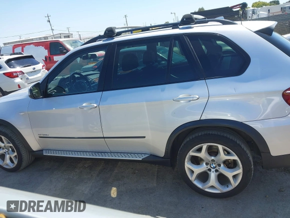 2012 BMW X5 35d with VIN 5UXZW0C58CL671141, listed as a IAAI auction lot 42644381 with 127,464 mi miles and . Bid and sale history available at DreamBid. Image 14.