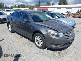 2014 Ford Taurus SE z VIN 1FAHP2D87EG171651, wystawiony jako IAAI lot #42249649 z przebiegiem 96 557 mil mil oraz . Historia ofert i sprzedaży dostępna na DreamBid. Obrazek 1.