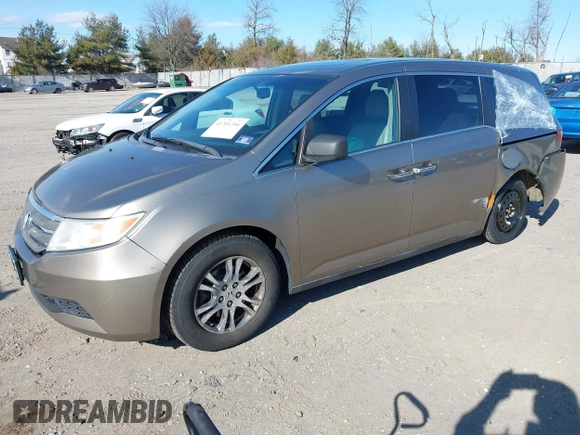 2012 Honda Odyssey EX-L with VIN 5FNRL5H63CB016526, listed as a IAAI auction lot 41701396 with 132,016 mi miles and . Bid and sale history available at carsss.com. Image 20.