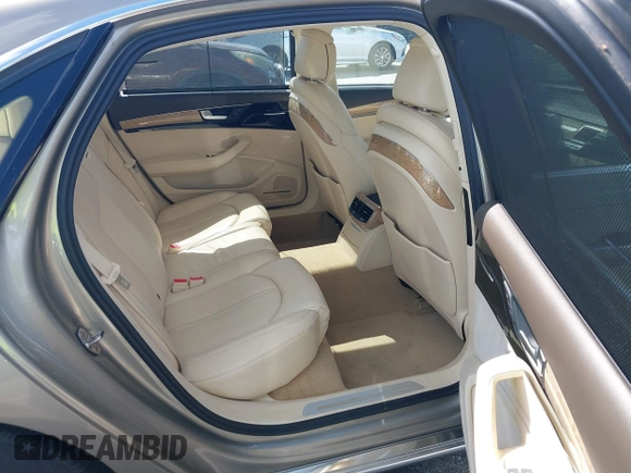2012 Audi A8 z VIN WAURVAFD0CN001646, wystawiony jako IAAI lot #41524110 z przebiegiem 105 187 mil mil oraz . Historia ofert i sprzedaży dostępna na DreamBid. Obrazek 8.