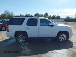 2011 GMC Yukon SLE with VIN 1GKS2AE01BR351651, listed as a IAAI auction lot 41942032 with 337,165 mi miles. Bid and sale history available at carsss.com. Image 13.