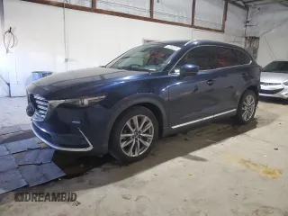 2020 Mazda CX-9 Grand Touring with VIN JM3TCADYXL0404266, listed as a Copart auction lot 52353325 with 80,986 mi miles and Salvage title. Bid and sale history available at DreamBid. Image 1.