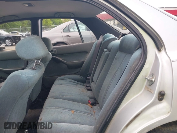 1993 Toyota Camry LE z VIN 4T1SK12E0PU290398, wystawiony jako IAAI lot #42032664 z przebiegiem 264 922 mil mil oraz . Historia ofert i sprzedaży dostępna na DreamBid. Obrazek 8.