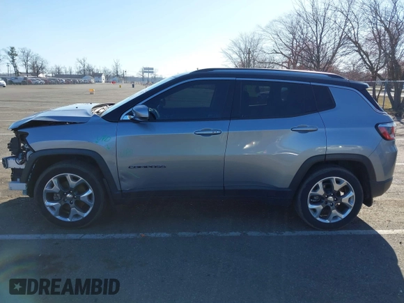2018 Jeep Compass Limited with VIN 3C4NJCCB6JT489123, listed as a IAAI auction lot 41824477 with 101,291 mi miles and . Bid and sale history available at DreamBid. Image 14.