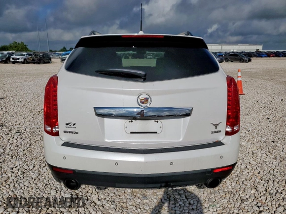 2014 Cadillac SRX Performance Collection with VIN 3GYFNCE39ES687733, listed as a Copart auction lot 62770665 with 151,714 mi miles and Salvage title. Bid and sale history available at DreamBid. Image 6.
