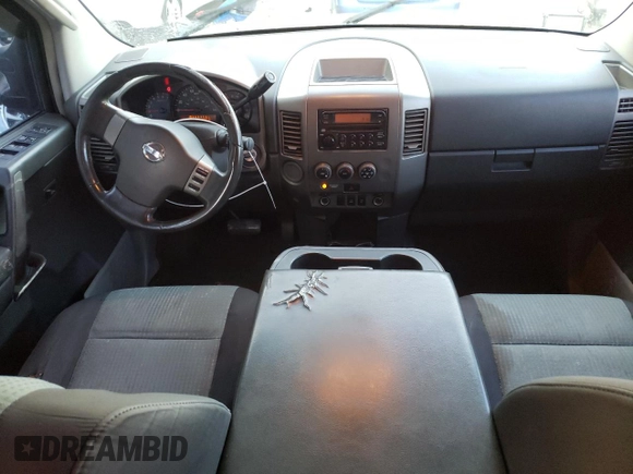 2004 Nissan Titan LE with VIN 1N6AA07A64N562975, listed as a Copart auction lot 85230234 with 99,973 mi miles and Salvage Title. Bid and sale history available at DreamBid. Image 8.