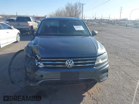 2018 Volkswagen Tiguan SEL z VIN 3VV3B7AXXJM088230, wystawiony jako IAAI lot #41680855 z przebiegiem 130 807 mil mil oraz . Historia ofert i sprzedaży dostępna na DreamBid. Obrazek 12.