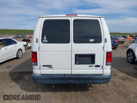 2012 Ford Econoline Cargo Commercial with VIN 1FTNE1EW0CDB06455, listed as a IAAI auction lot 41666172 with 270,816 mi miles and . Bid and sale history available at carsss.com. Image 16.