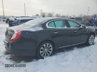 2014 Lincoln MKS with VIN 1LNHL9DKXEG603185, listed as a Copart auction lot 88228605 with 125,055 mi miles and Clean Title. Bid and sale history available at DreamBid. Image 3.