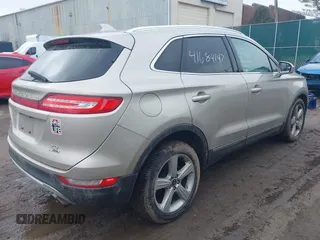 2015 Lincoln MKC with VIN 5LMCJ1A96FUJ30579, listed as a IAAI auction lot 41684147 with 144,364 mi miles and . Bid and sale history available at DreamBid. Image 4.