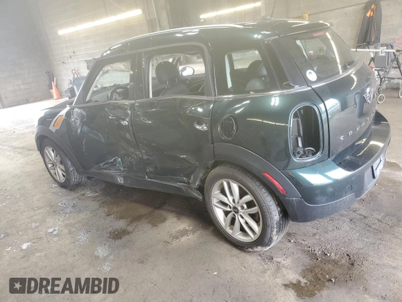 2014 MINI Countryman with VIN WMWZB3C58EWR37237, listed as a Copart auction lot 55596935 with 127,458 mi miles and Salvage Title. Bid and sale history available at DreamBid. Image 2.